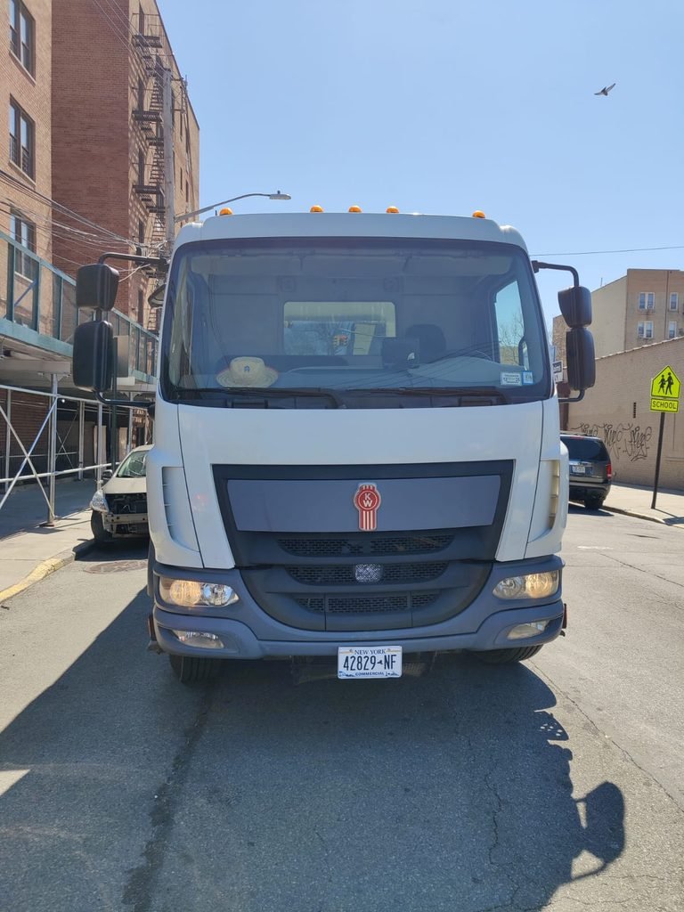 commercial flatbed truck before vinyl lettering installation