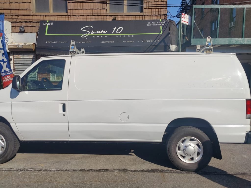plain white cargo work van before custom vehicle lettering nyc